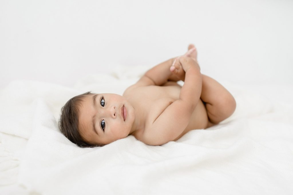 Newborn natural lighting photographer taking Tampa Florida 6 month baby studio session photos