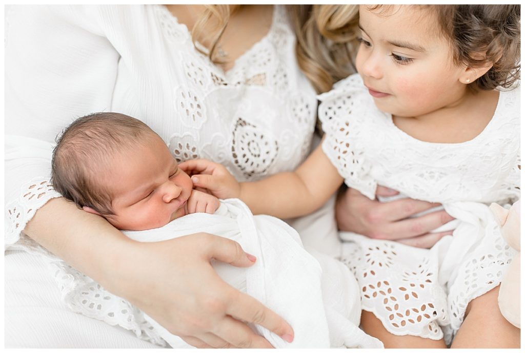 Newborn natural lighting Tampa photographer taking beautiful baby studio photos