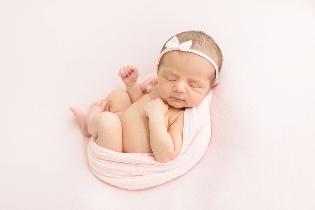 Newborn natural lighting photographer taking Tampa Florida baby studio photos