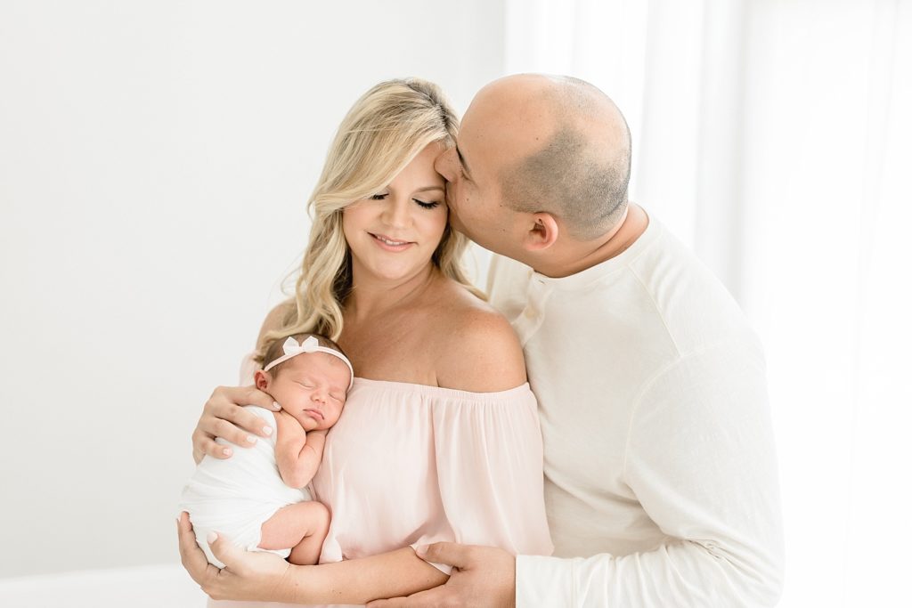 Newborn natural lighting photographer taking Tampa Florida baby studio photos