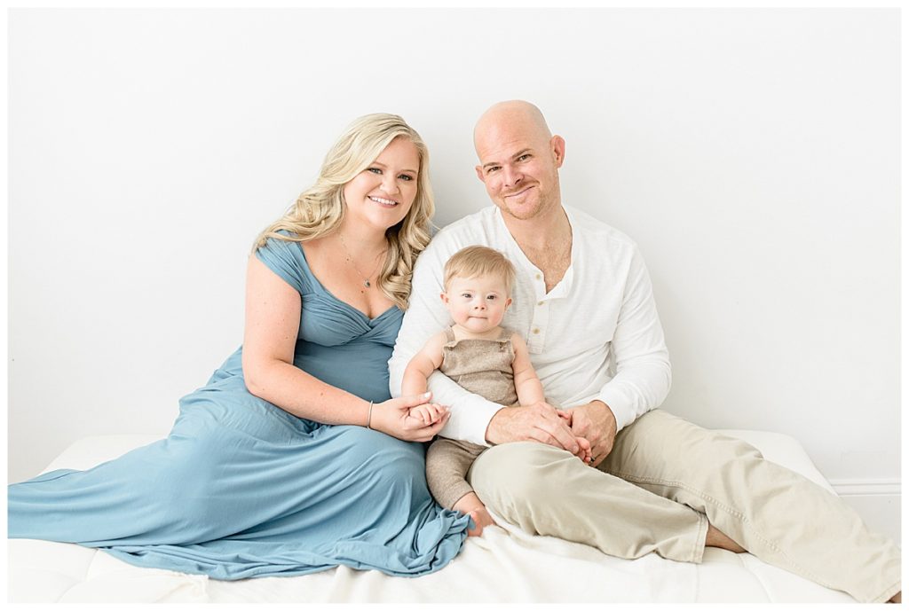 Newborn natural lighting photographer taking Tampa Florida smile-filled one year milestone family photos