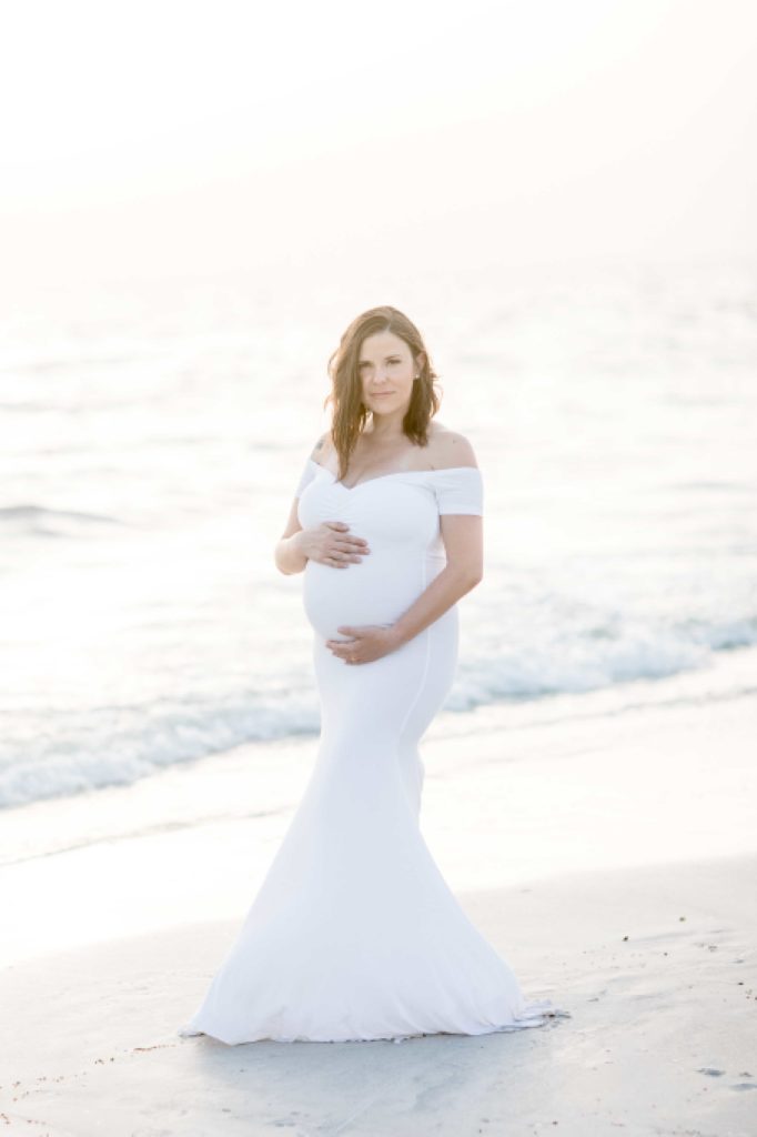 St. Petersburg family photographer taking beautiful photos at Florida beach