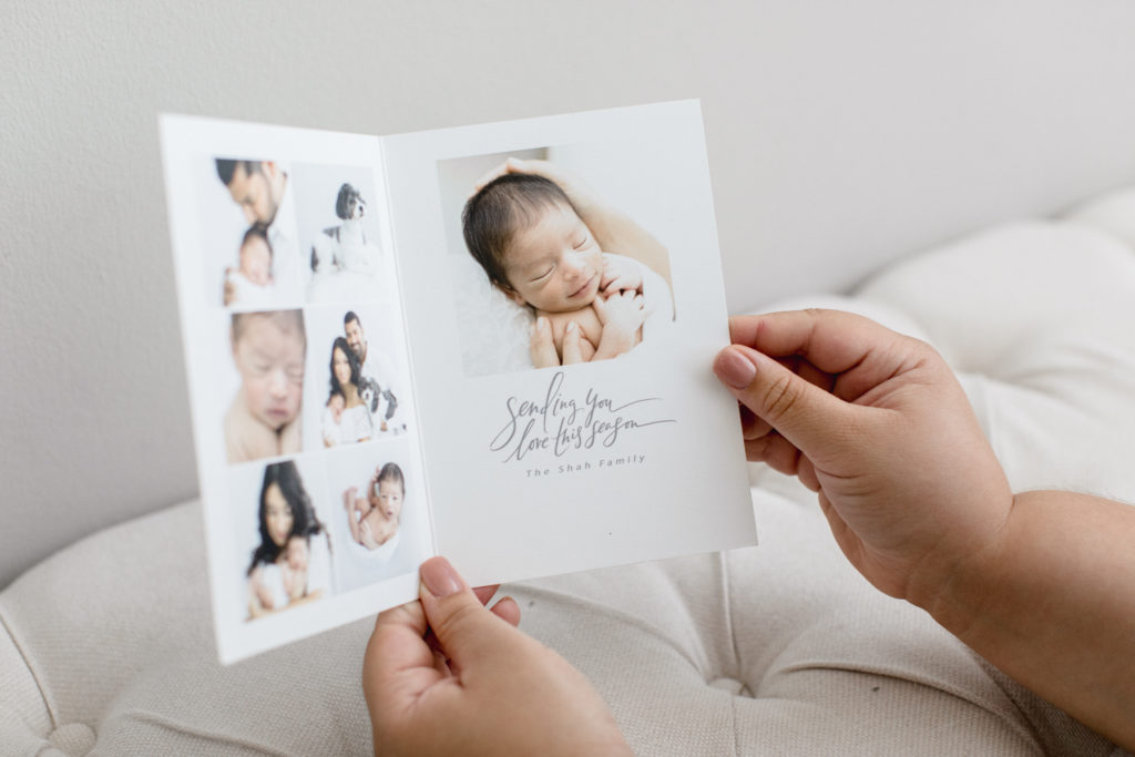 Inside of holiday card with pictures of family, dog, and newborn baby