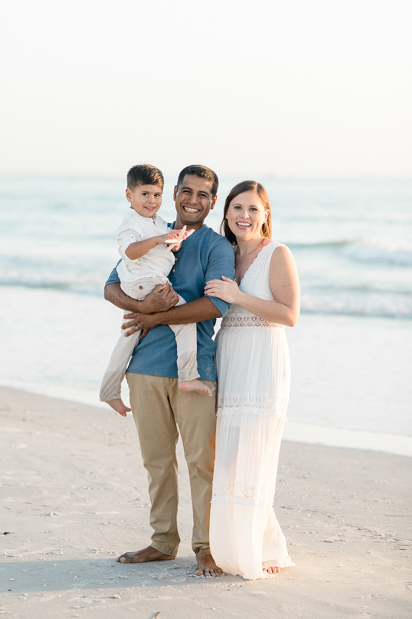Family session on the beach in Tampa in January. Photos by Brittany Elise Photography.