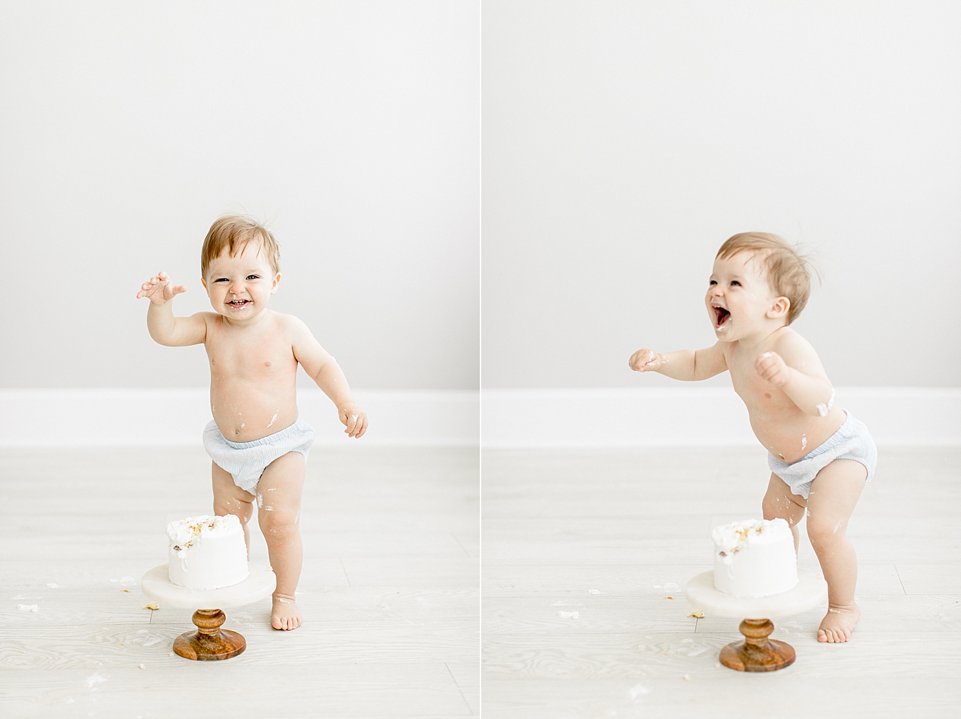 One year old boy standing up and smiling after his birthday cake smash. Photo by Brittany Elise Photography.
