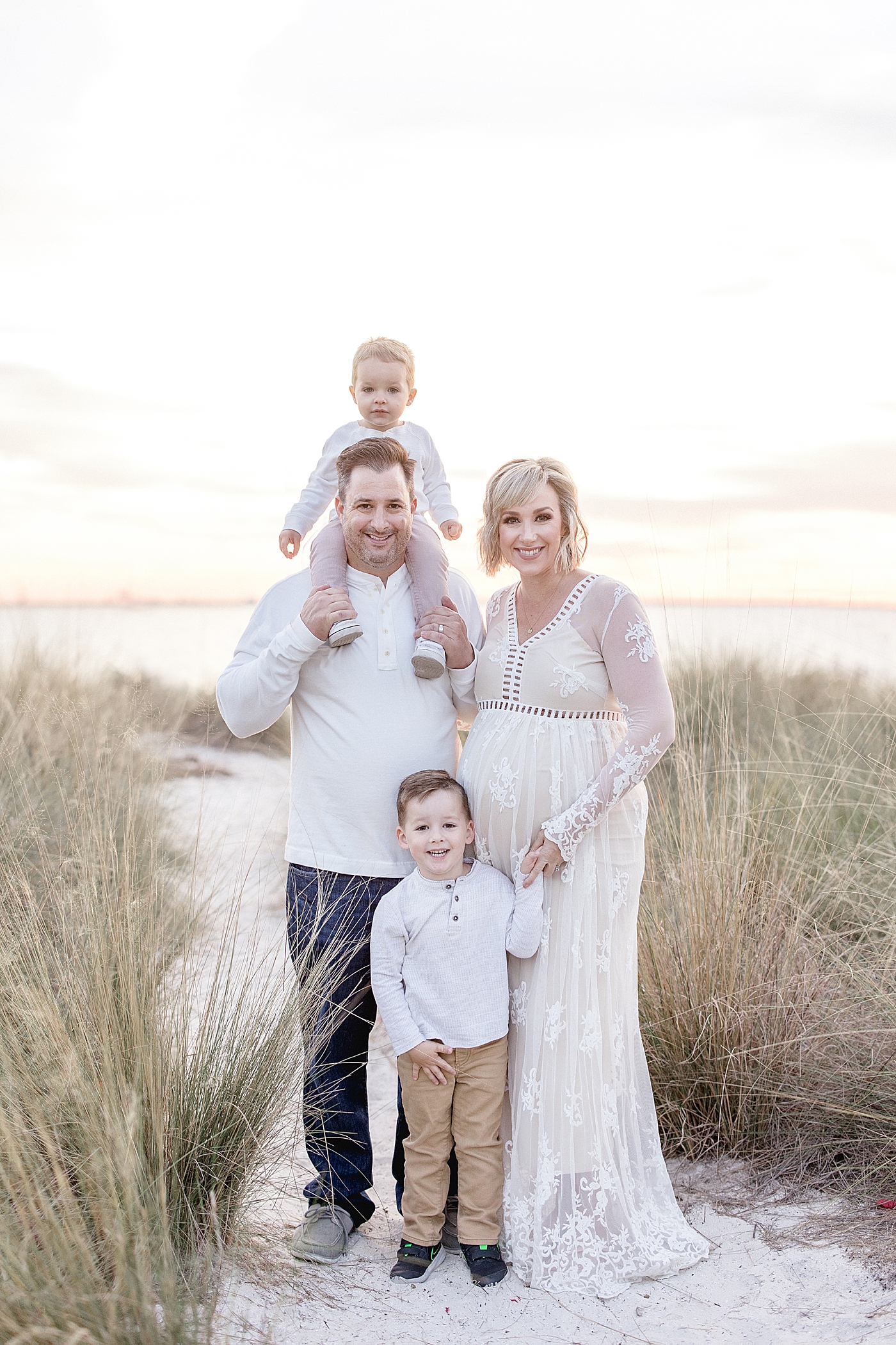 Sunset maternity session at Cypress Point Park with family of 4, soon to be 5! Photo by Brittany Elise Photography.