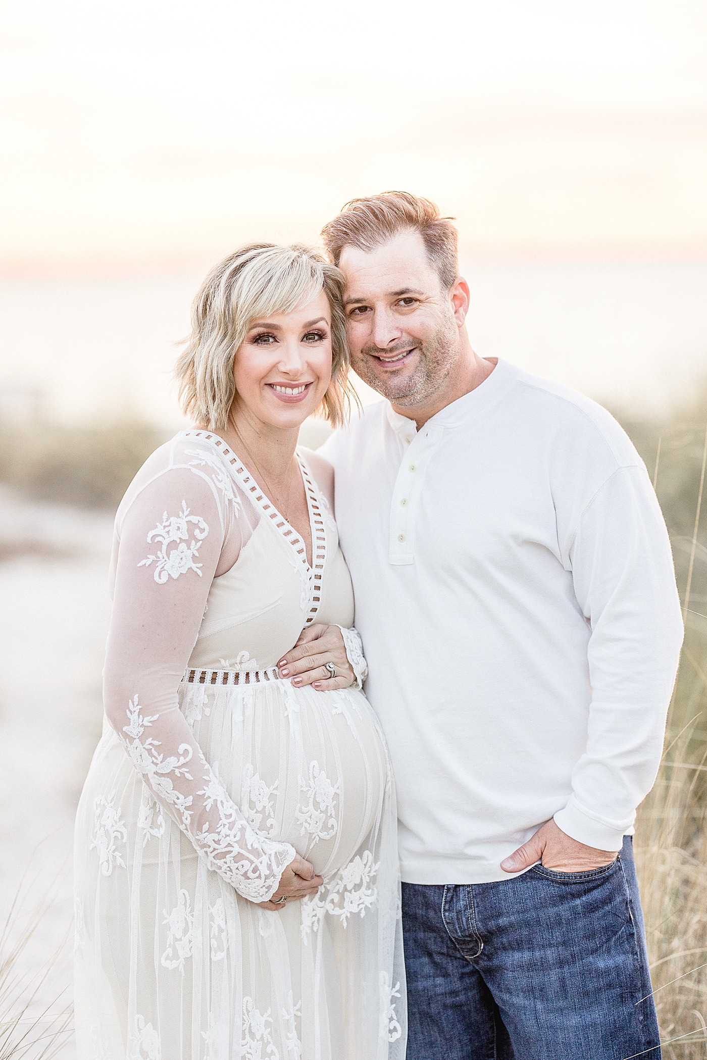 Mom and Dad celebrate third pregnancy, a baby girl, with maternity photos with Brittany Elise Photography.