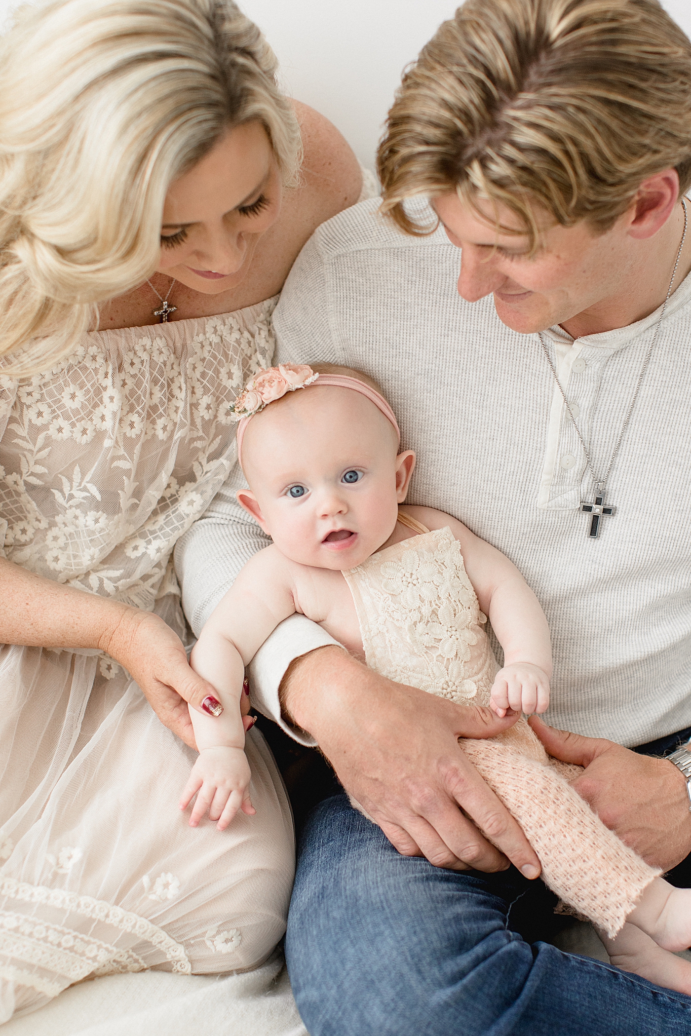 Family portrait of Brittany Lincicome, her husband and baby girl. Photo by Brittany Elise Photography.