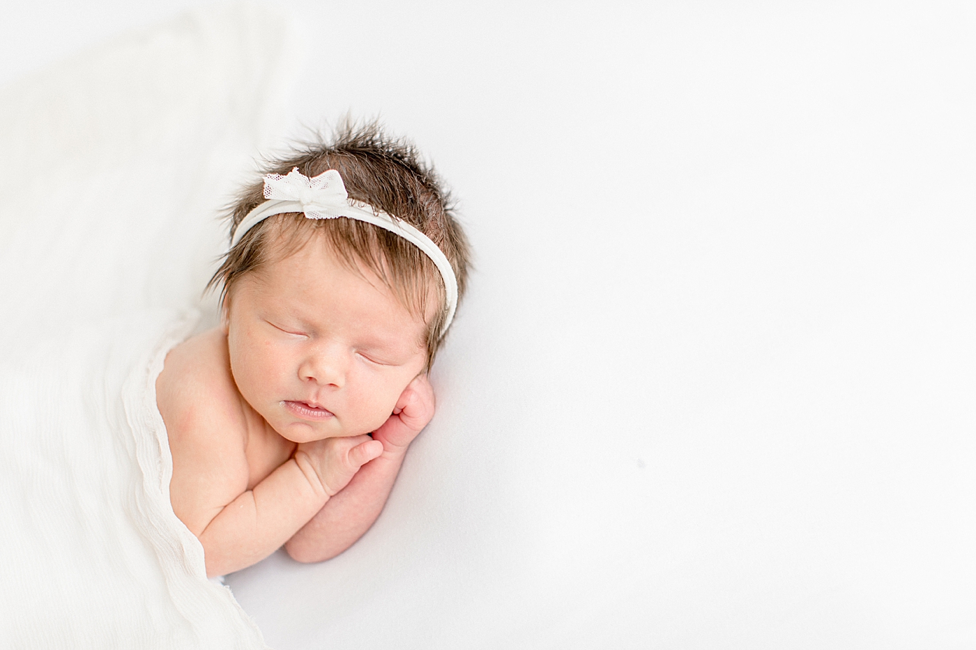 Baby girl newborn session in studio in Tampa, Fl. Photo by Brittany Elise Photography.
