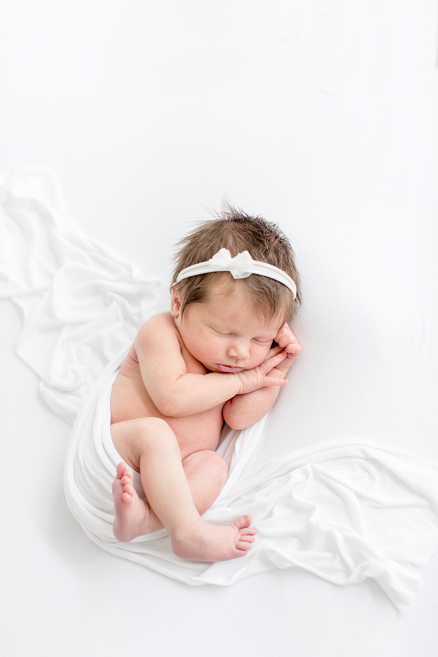 Baby girl newborn session in studio in Tampa, Fl. Photo by Brittany Elise Photography.
