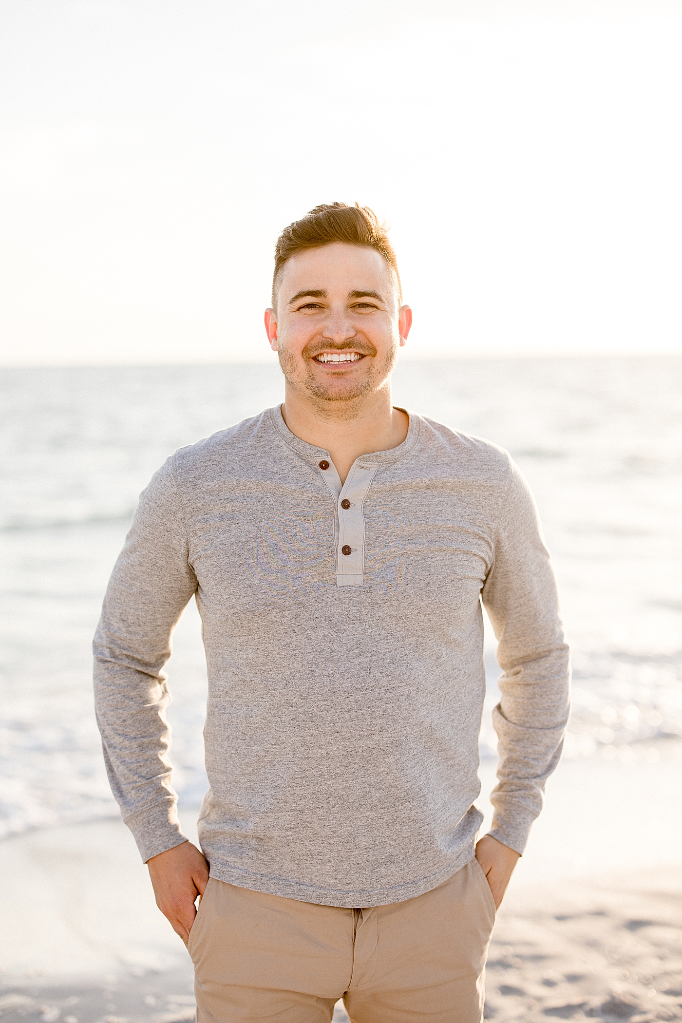 Portrait of Dad at sunset on the beach during family photoshoot. Photo by Brittany Elise Photography.