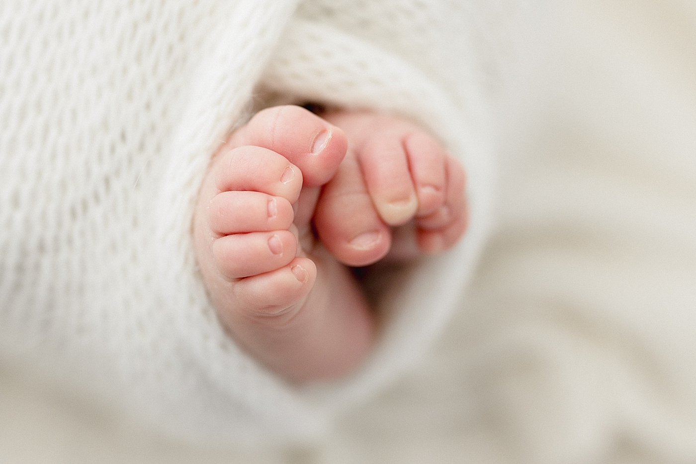 Newborn baby toes. Photo by Brittany Elise Photography.