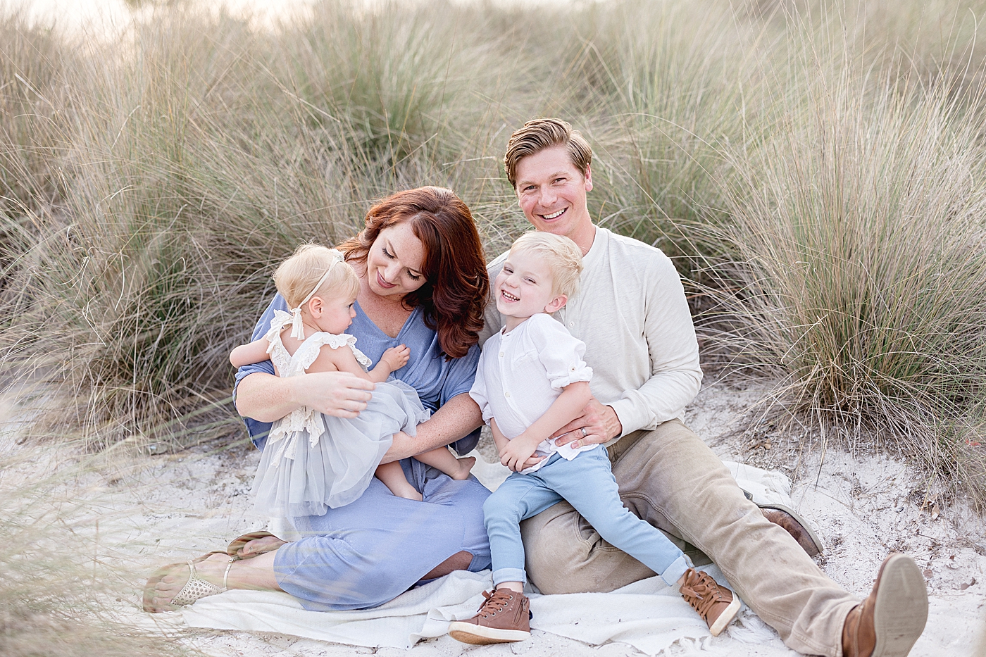 Family portraits at sunset at Cypress Point Park in Tampa, FL. Photo by Brittany Elise Photography.
