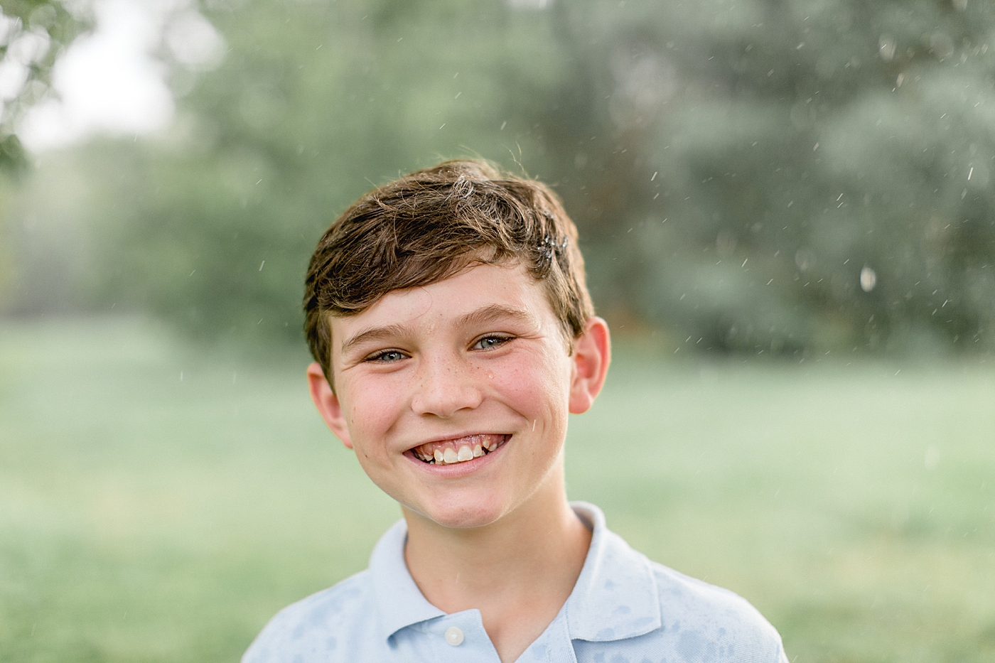 Children's outdoor portrait during the rain. Photo by Brittany Elise Photography.