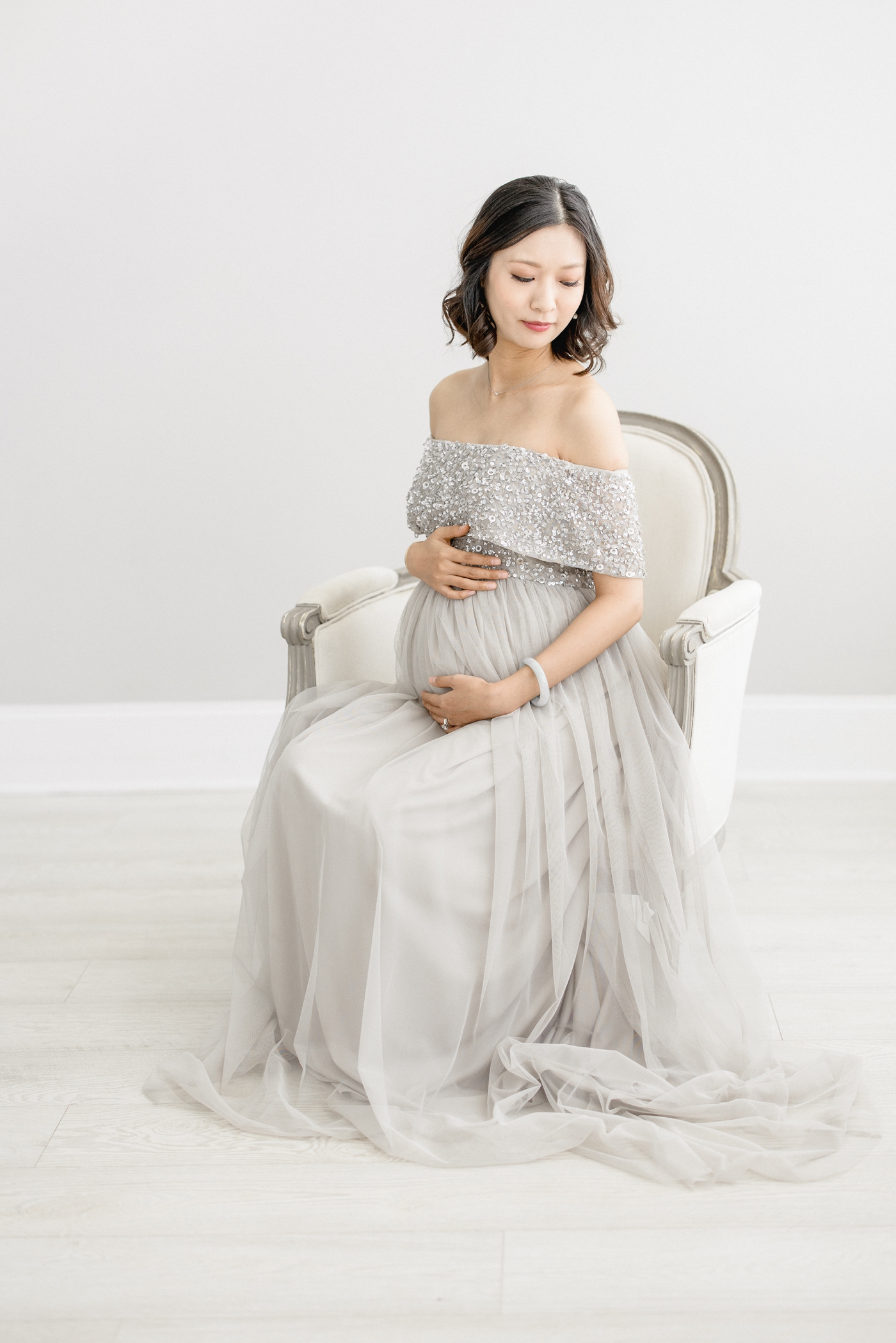 Classic maternity portraits taken in Tampa Bay studio. Photo by Brittany Elise Photography.