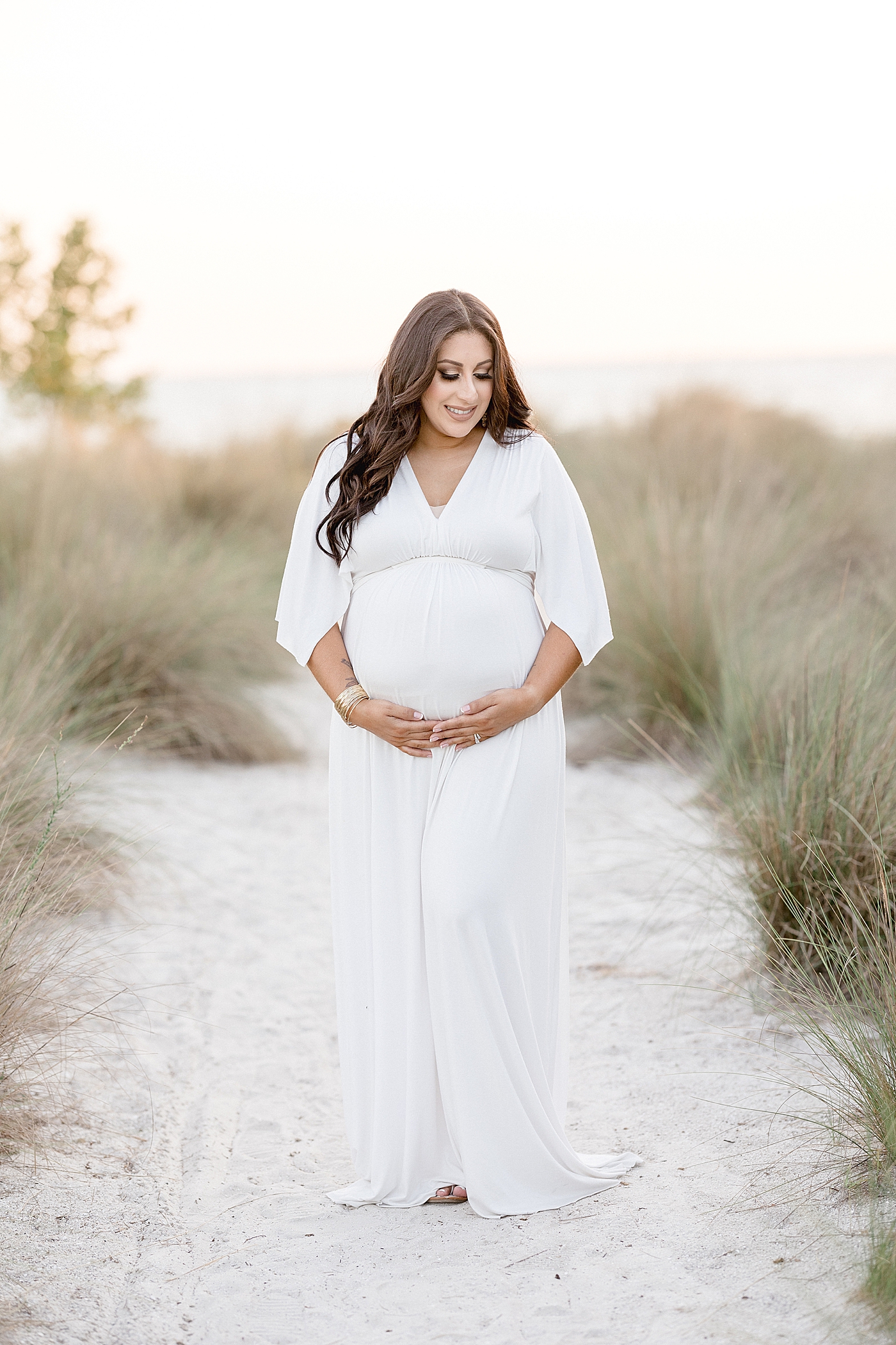 Sunset maternity session at Cypress Point Park. Photo by Brittany Elise Photography.