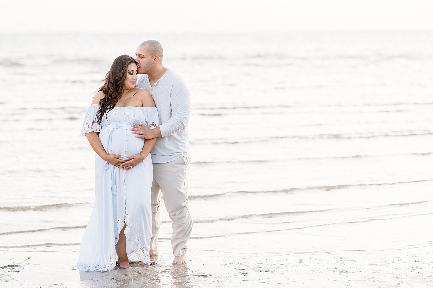Sunset maternity session at the beach in Tampa, FL. Photo by Brittany Elise Photography.