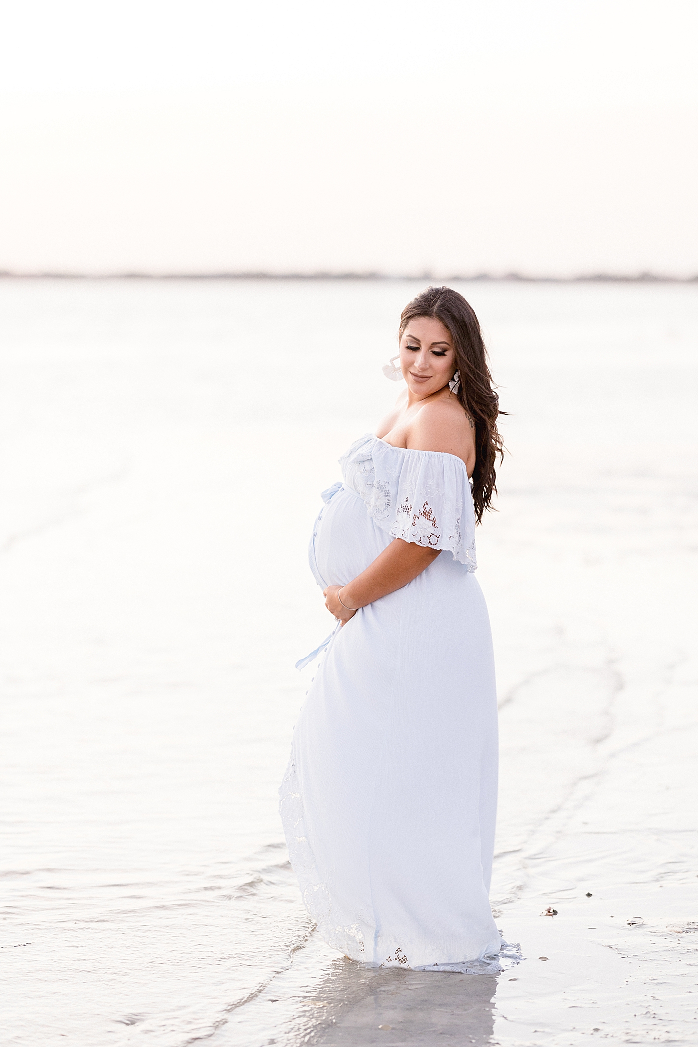 Pregnancy photoshoot in blue Fillyboo maternity dress. Photo by Brittany Elise Photography.