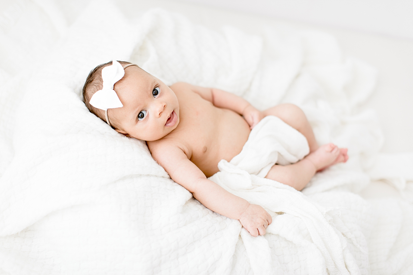 Studio newborn session with baby girl in Tampa, FL. Photo by Brittany Elise Photography.