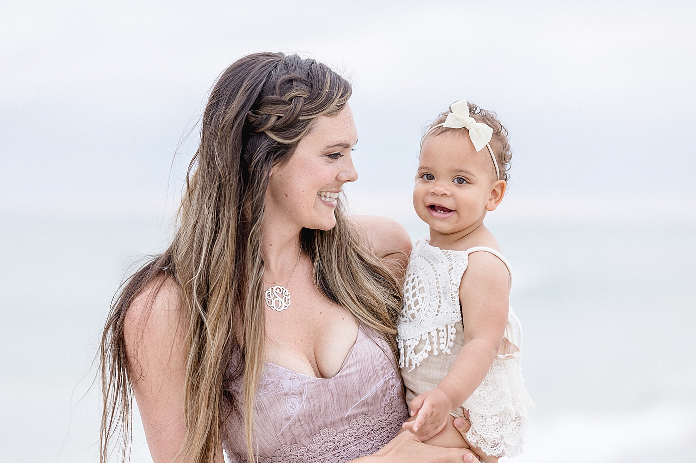 Mom and her baby girl for her first birthday session. Photo by Brittany Elise Photography.