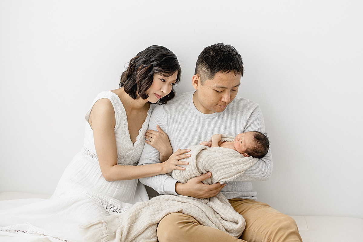 Studio newborn session in Tampa with first-time parents. Photo by Brittany Elise Photography.