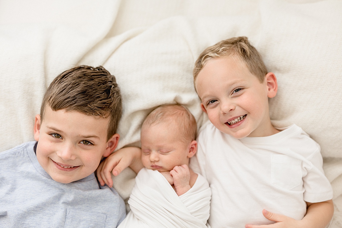 Sibling photos during newborn session. Photo by Brittany Elise Photography.