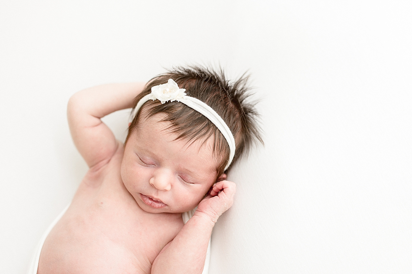 Newborn session in Tampa photography studio. Photos by Brittany Elise Photography.