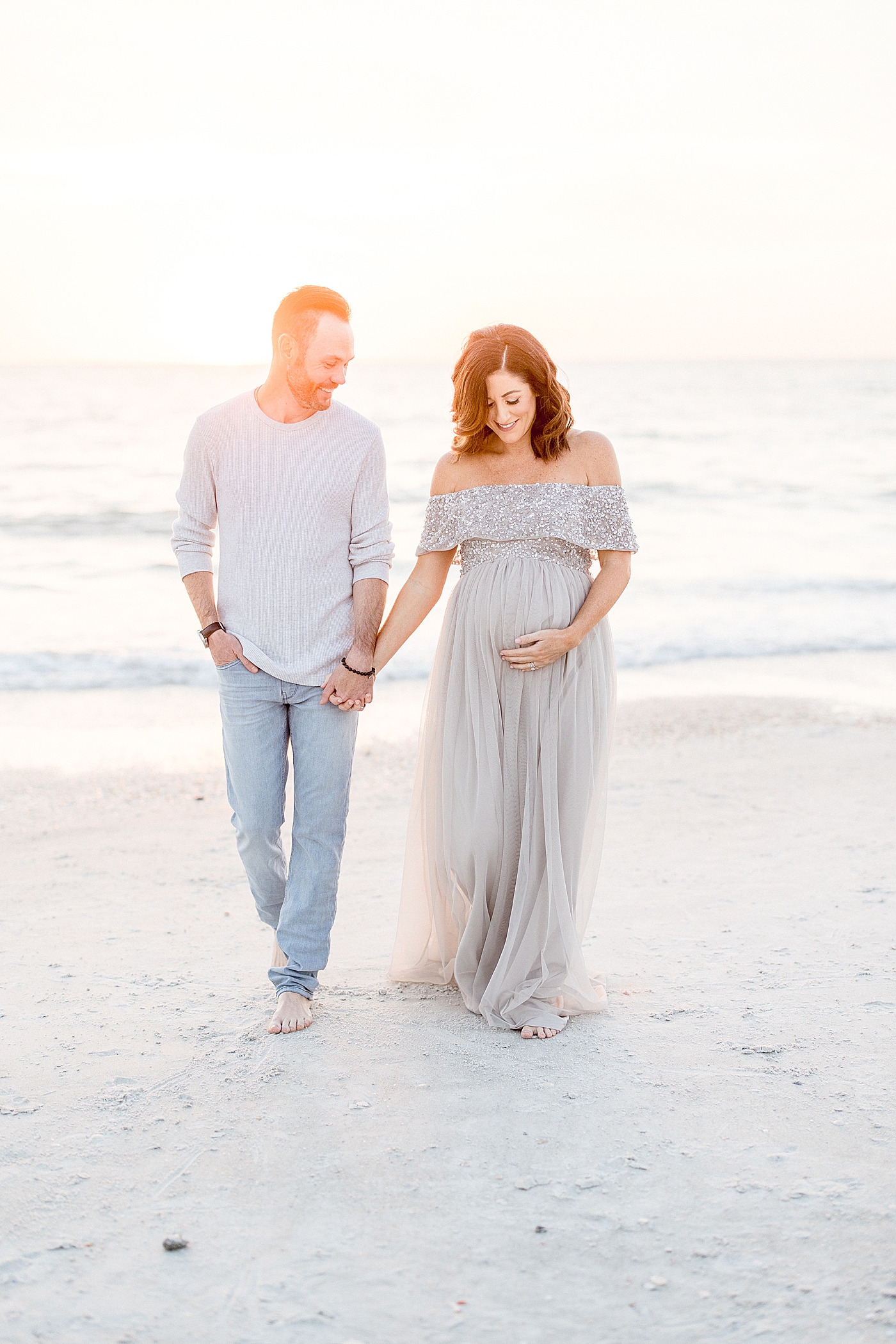 Golden hour maternity session in St. Pete Beach. Photo by Brittany Elise Photography.