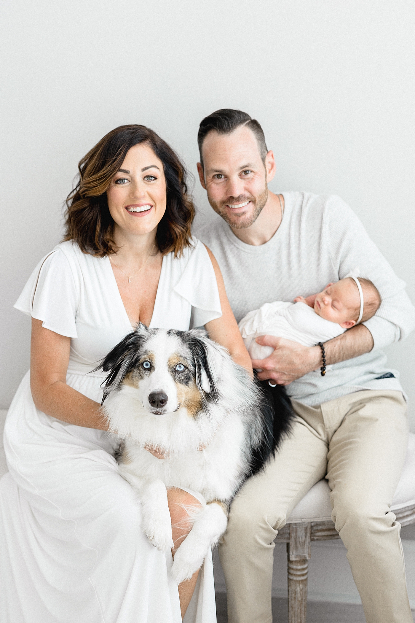 Newborn session with pets in the studio. Photo by Brittany Elise Photography.