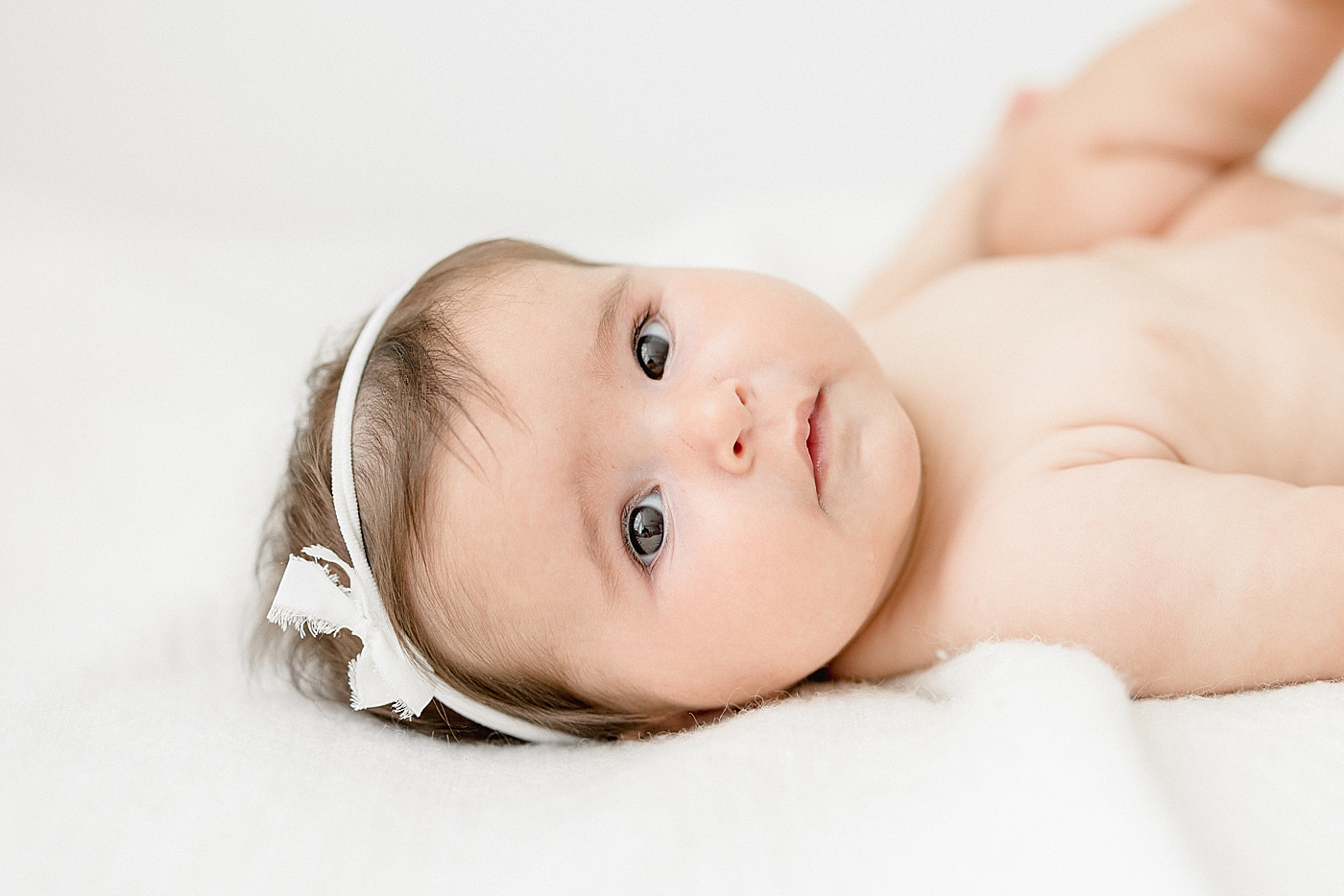 Six month milestone session for baby girl. Photos by Brittany Elise Photography.
