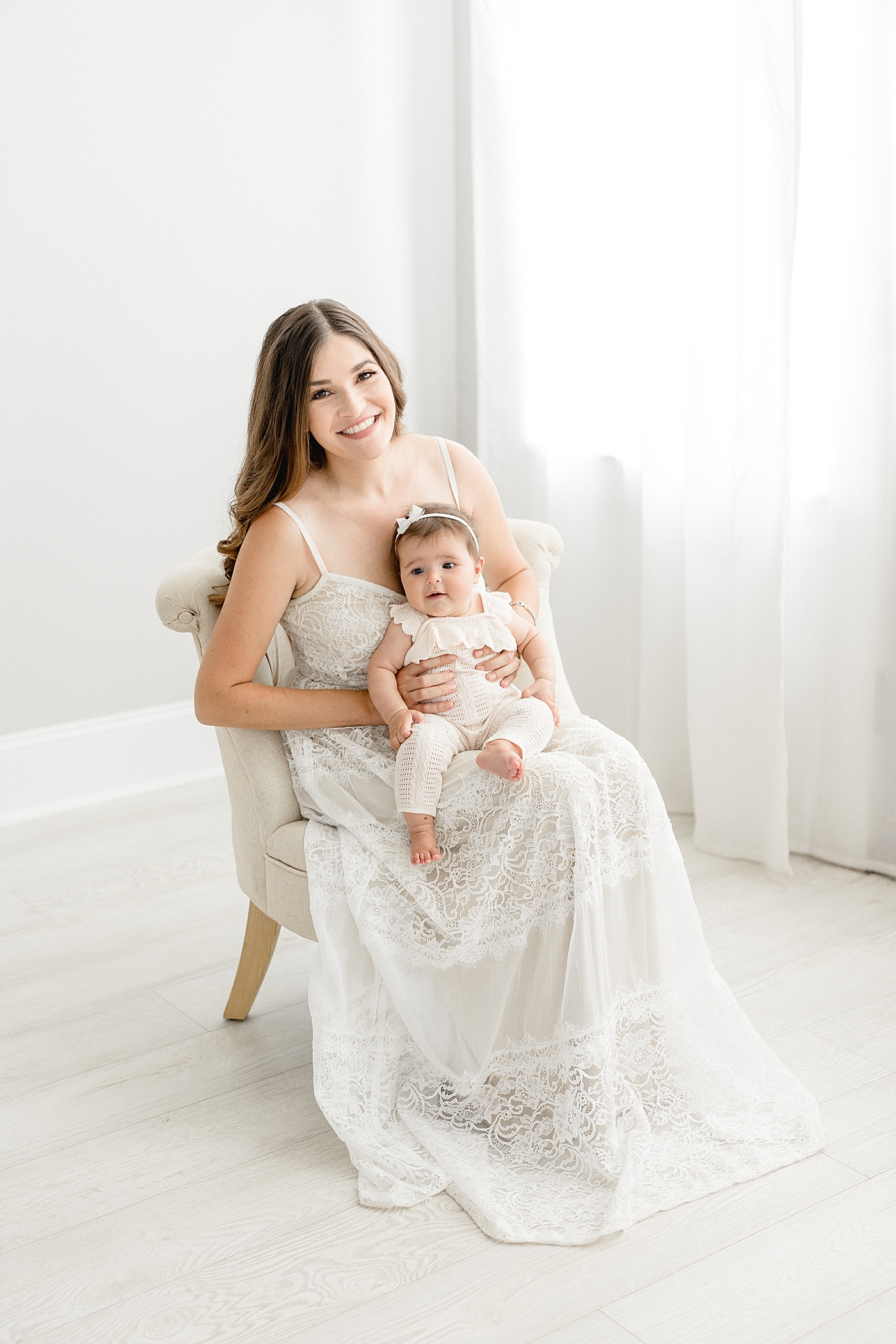 Mom and six month old daughter. Photos by Brittany Elise Photography.