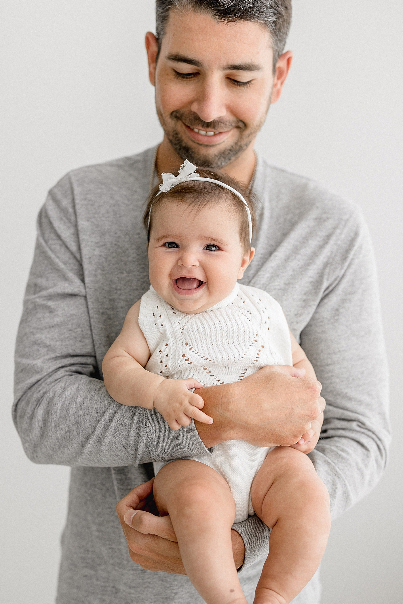 Dad and his six month old daughter. Photos by Brittany Elise Photography.