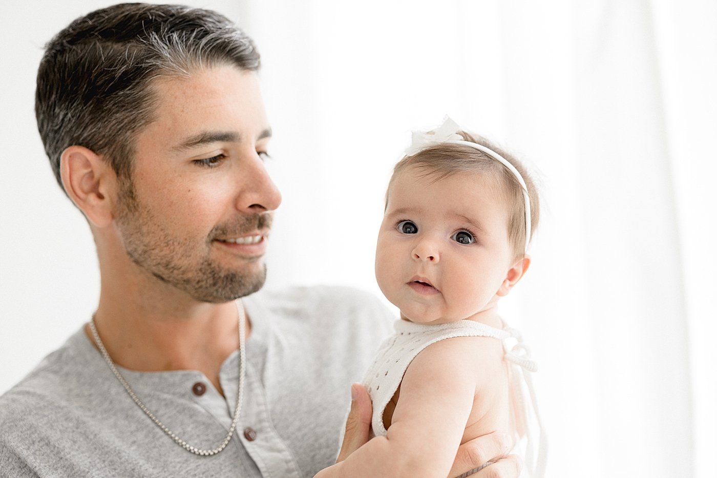 Dad and his six month old daughter. Photos by Brittany Elise Photography.