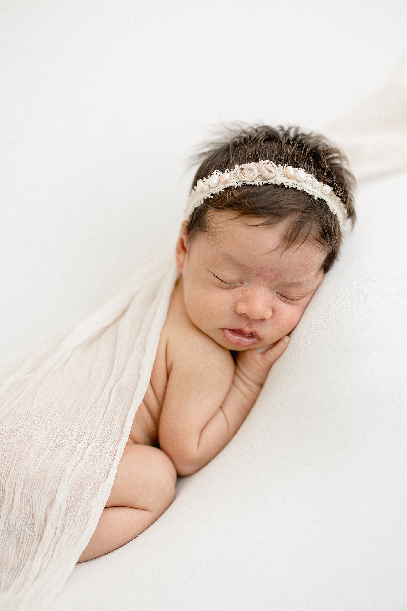 Studio newborn session for baby girl in Tampa, FL. Photo by Brittany Elise Photography.