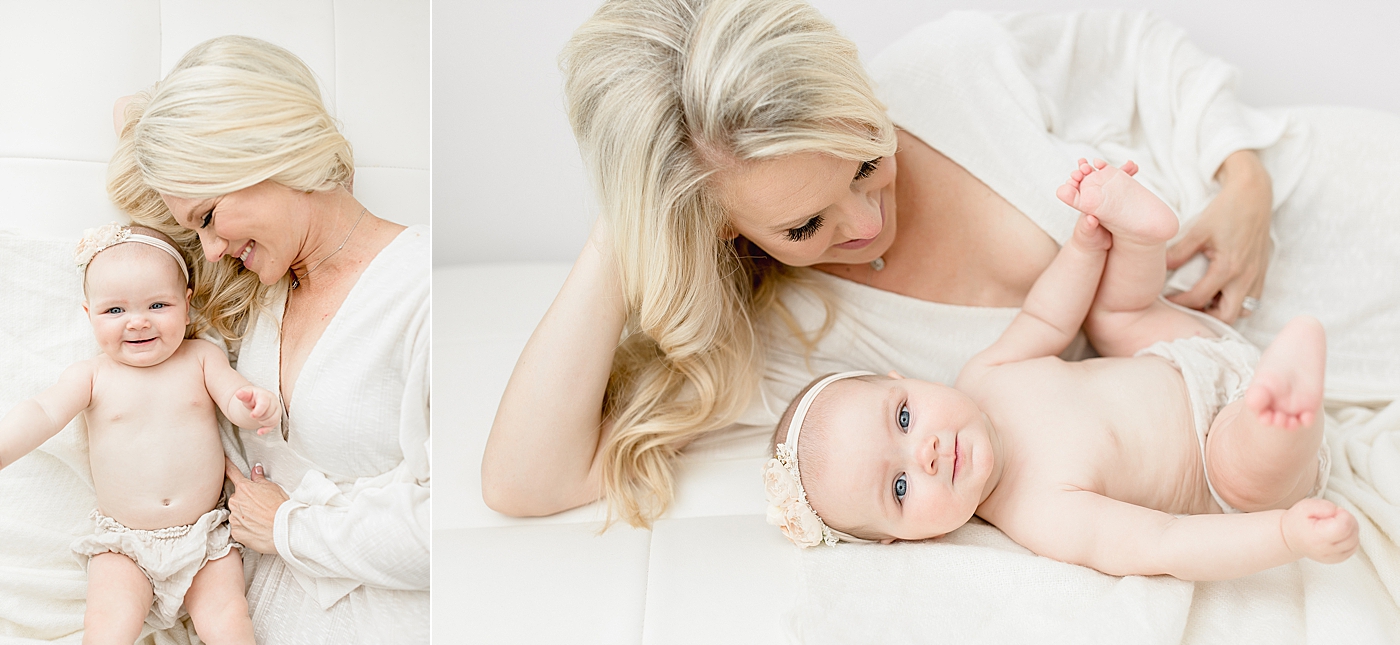 Mom laying with her baby girl at six months old. Photo by Brittany Elise Photography.