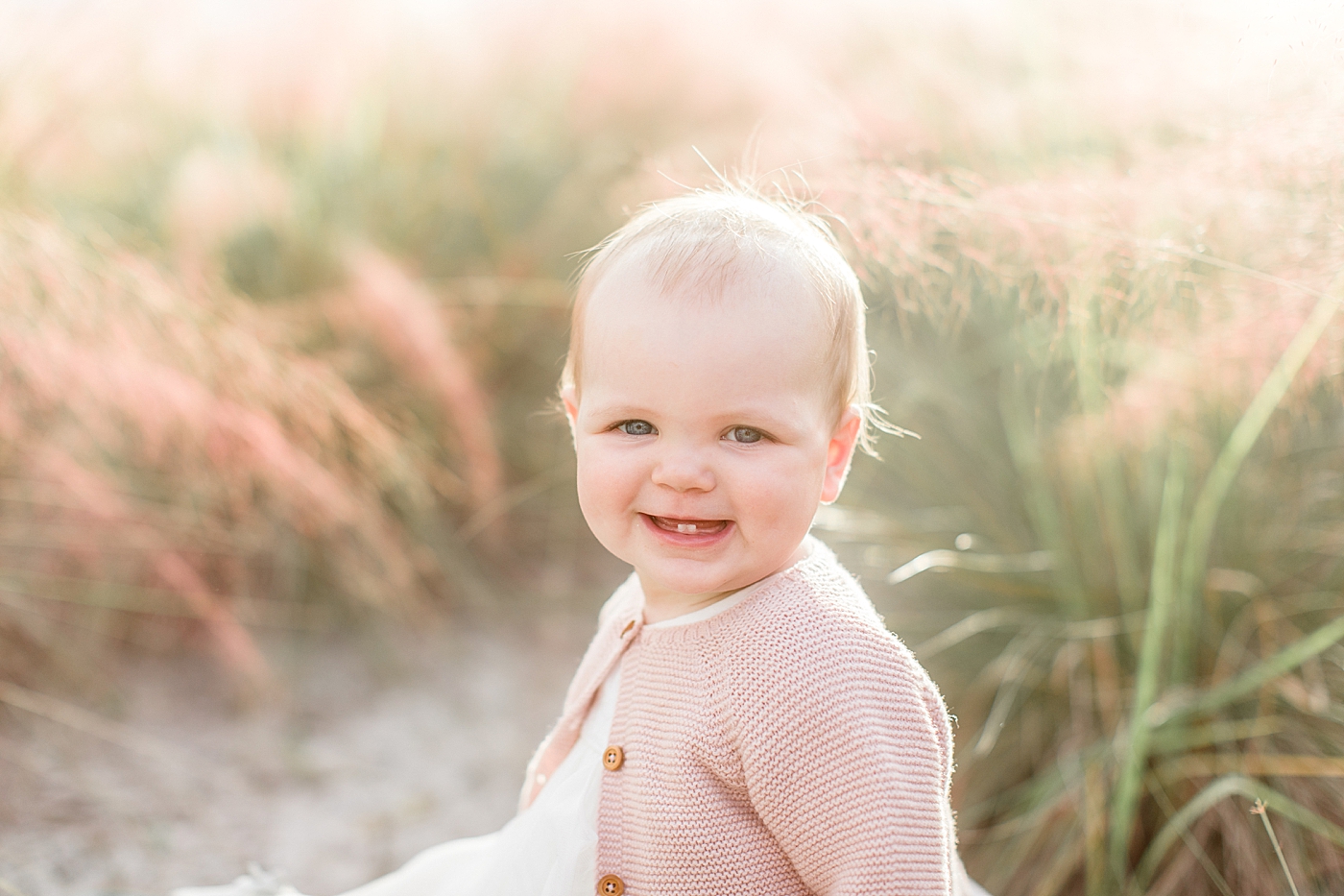 Sunset photos for one year old little girl. Photo by Brittany Elise Photography.
