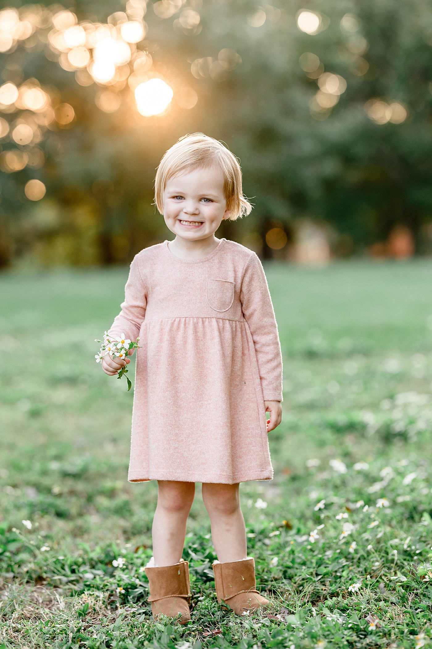 Two year old little girl at sunset. Photo by Brittany Elise Photography.