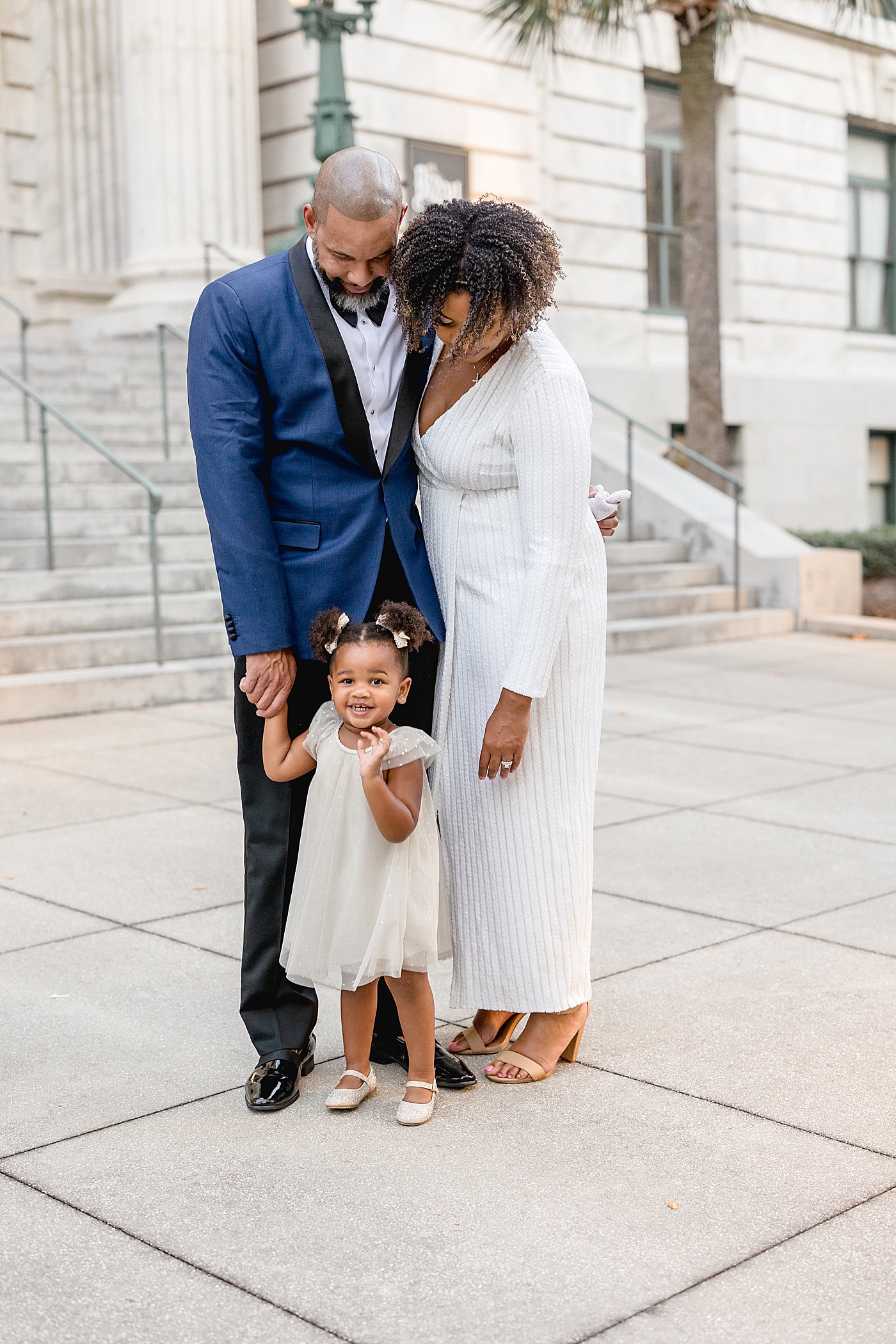 Family of three in front of the Le Meridien in Tampa. Photos by Brittany Elise Photography.