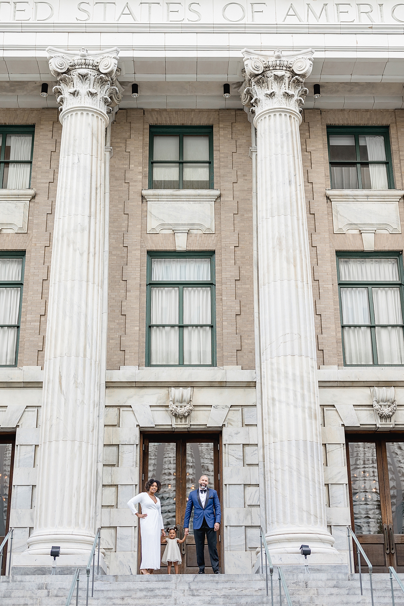 Family in front of the old federal courthouse, now the Le Meridien Hotel. Photos by Brittany Elise Photography.