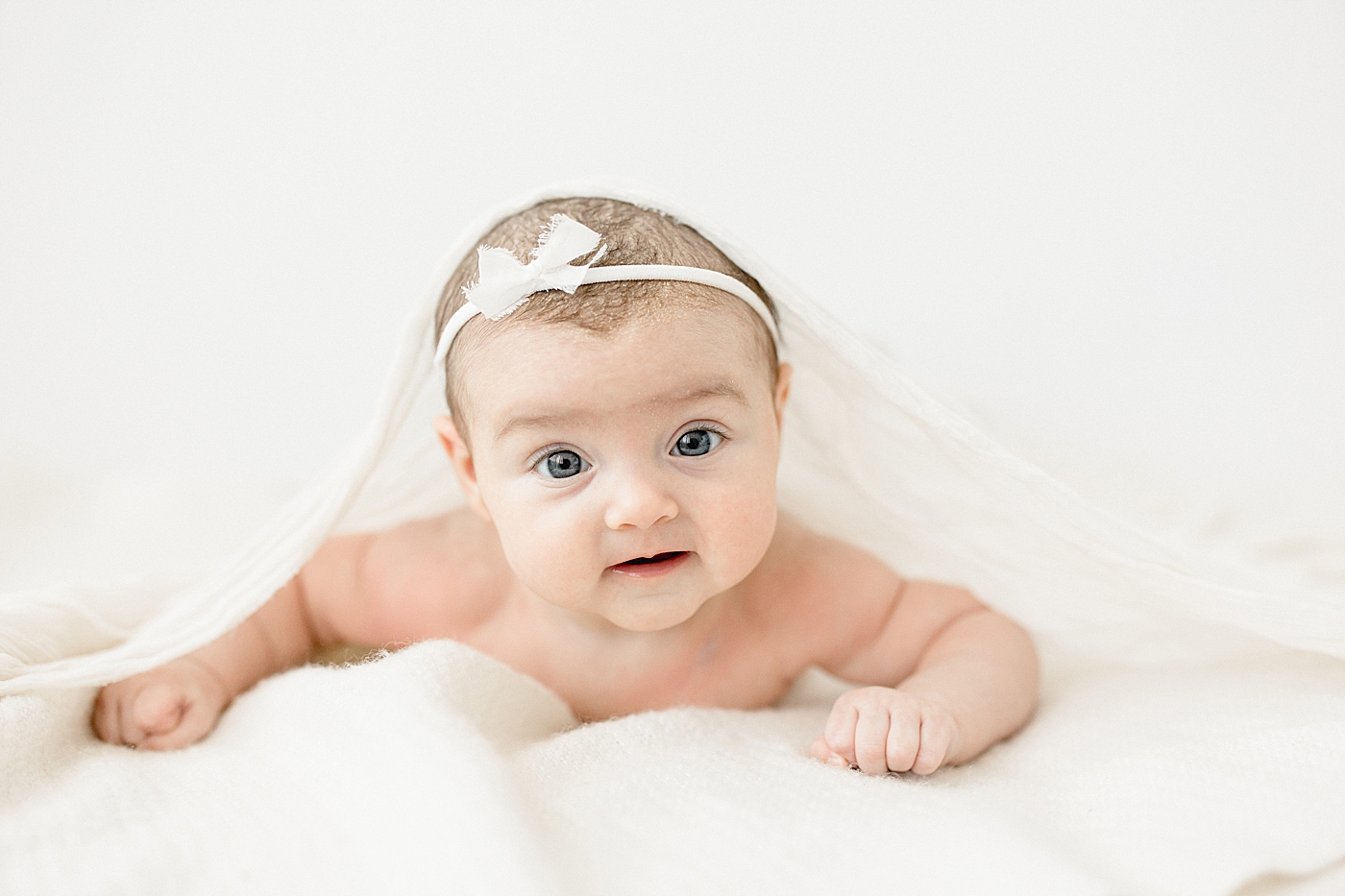 Tummy time for three month old during photoshoot with Brittany Elise Photography.