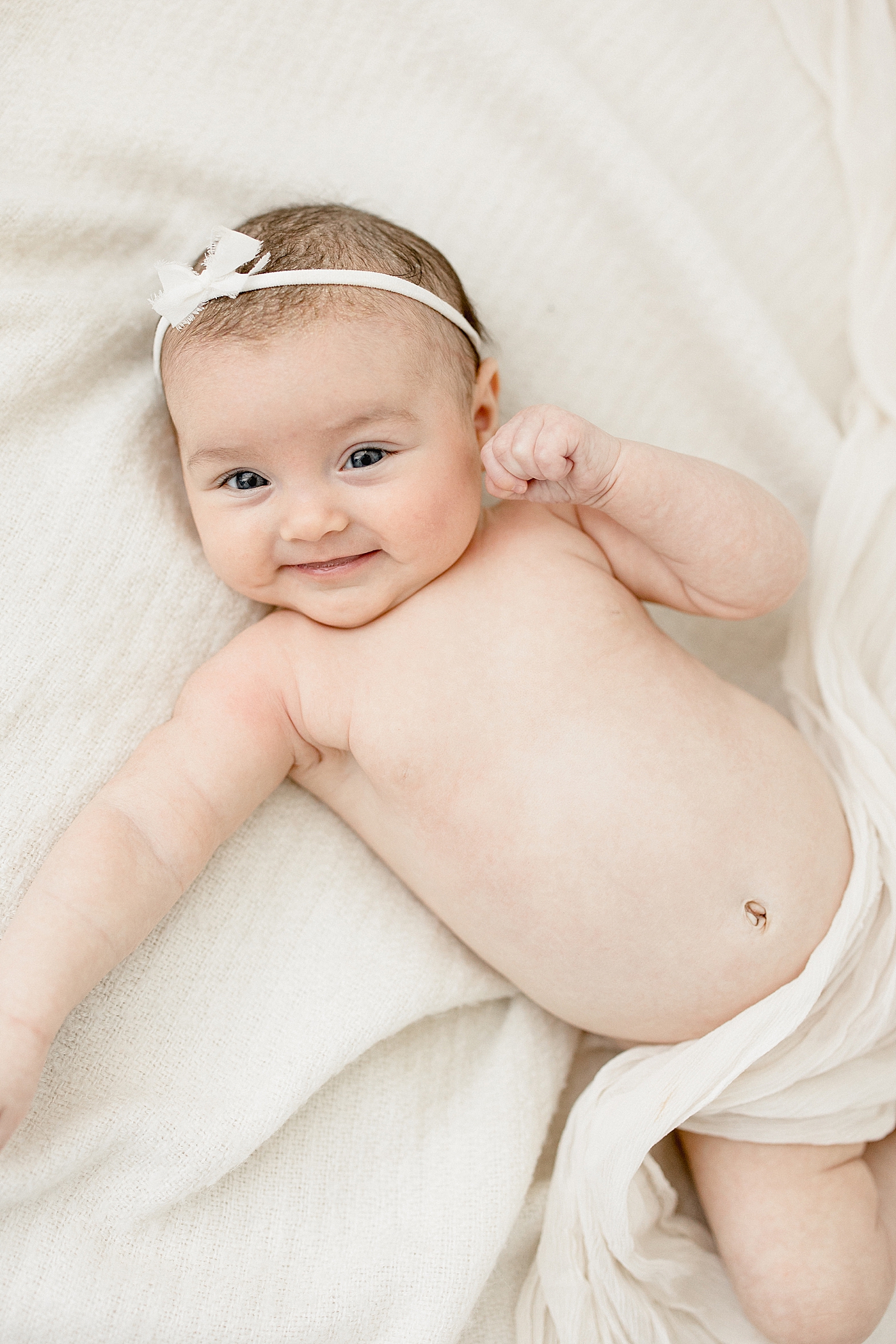 3 month milestone simplicity session in studio for baby girl. Photo by Brittany Elise Photography.