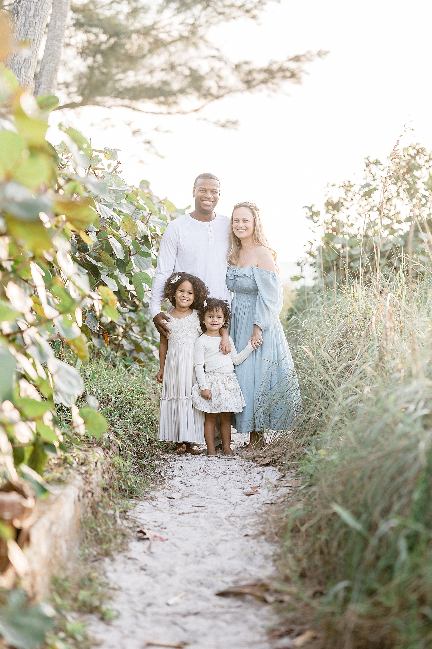 Family portraits on the beach with Brittany Elise Photography.