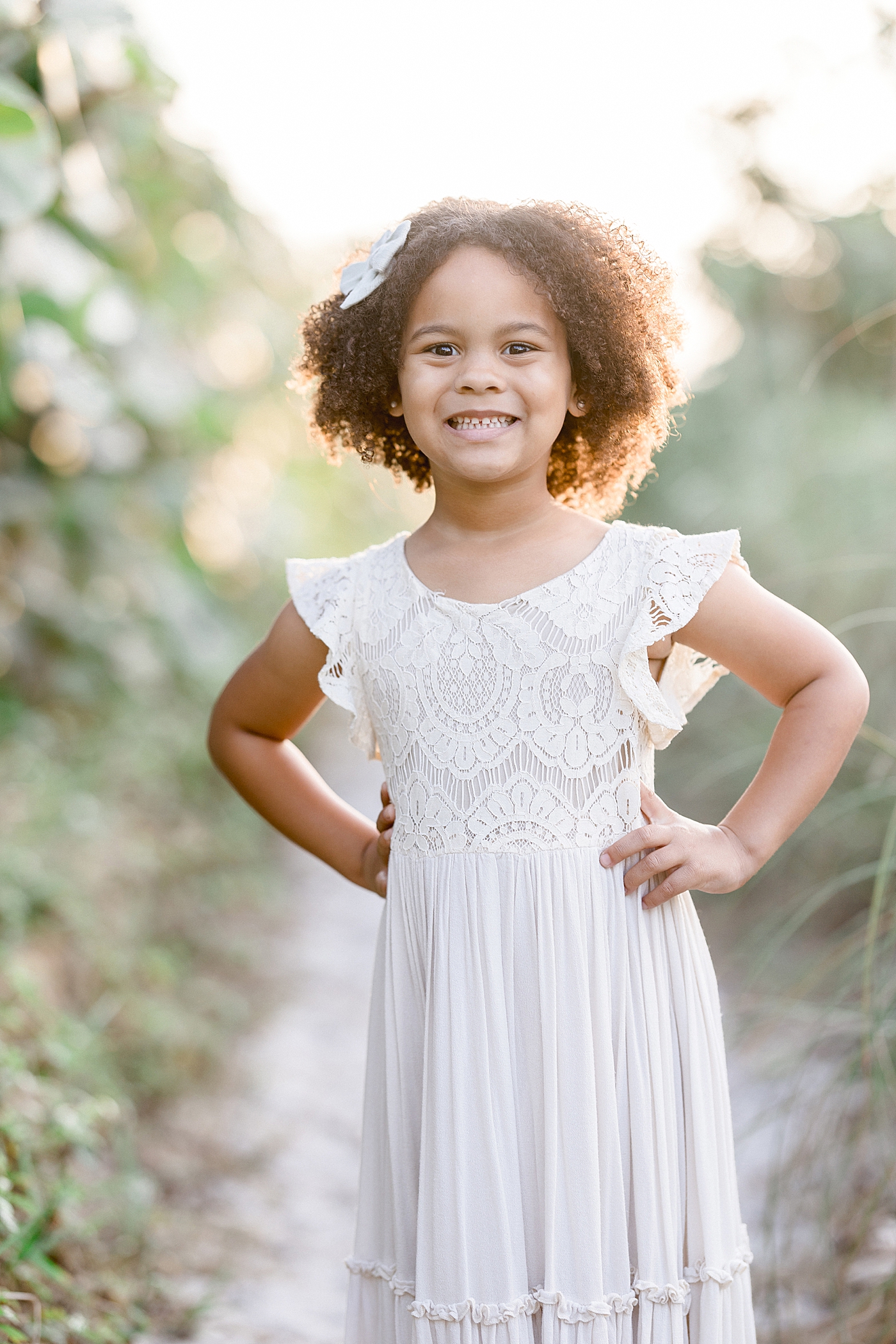 Children's portrait during sunset beach session. Photo by Brittany Elise Photography.